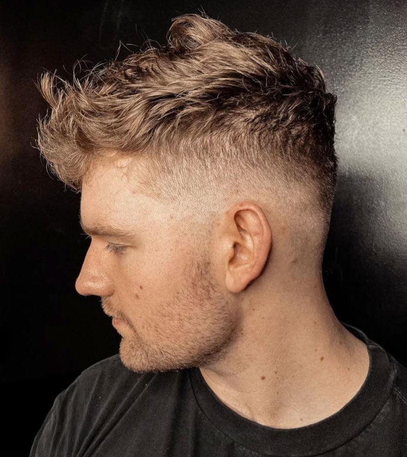 man getting barber cut